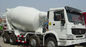 16cbm 8x4 Sinotruk HOWO कंक्रीट मिक्सर ट्रक लाल सफेद रंग 20-60 टन CCC पारित